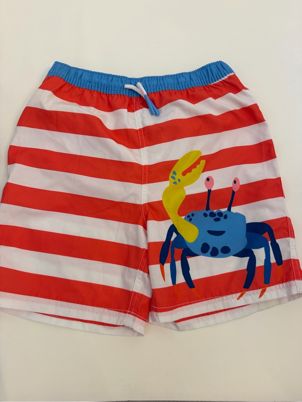 Mini Boden boys Red & White Striped Swim Shorts with Blue Crab Graphic size 9/10